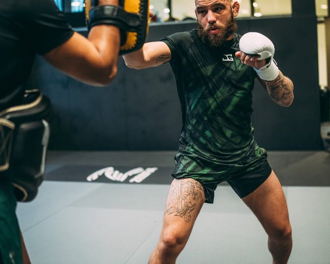 Wat leer je  bij een MMA-seminar van een professionele vechter